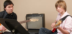 Electric Guitar Lessons - Acoustic Guitar Lessons - Electric Bass Guitar Lessons - Tauber Music School - Winnipeg Manitoba