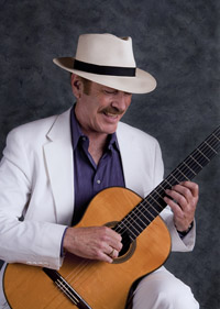 Guitar Instructor Terrence Farrell demonstrating finger picking technique